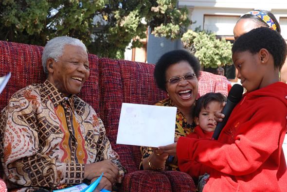Mr. Mandela and Ms. Graça Machel with children during a Nelson Mandela Children’s Fund event, August 2007.