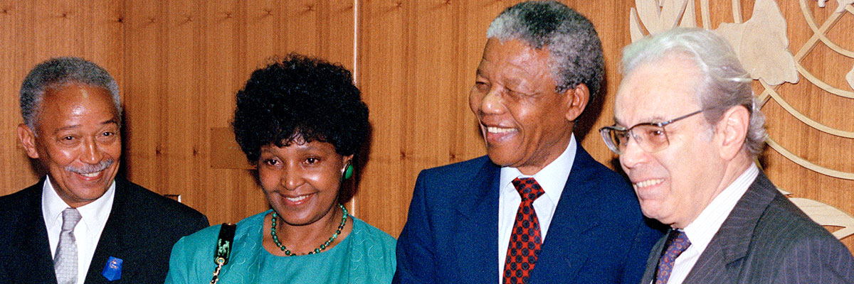 Secretary-General Javier Perez de Cuellar (extreme right) meets with Nelson and Winnie Mandela. On the far left is Mayor David Dinkins of New York City. UN Photo/Milton Grant