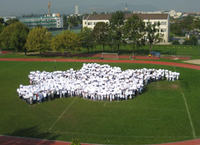 students forming shape of dove