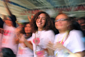 young women clapping