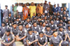 Deputy Special Representative of the SG, Henrietta Mensa-Bonsu, and UN corrections officers participate in a graduation ceremony for Liberian prison guards, trained by UNMIL, 2009.  UN Photo