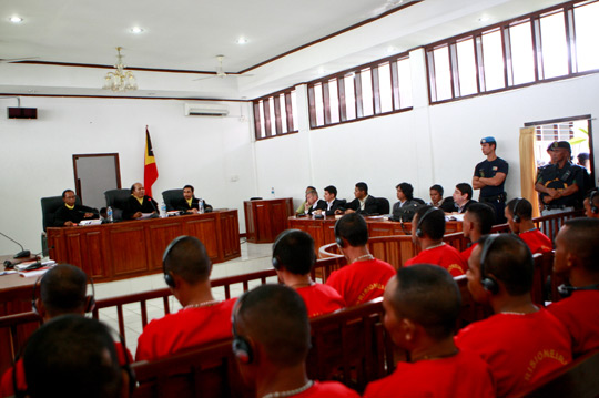 Judges in a Dili District courtroom hand down verdicts in the trial against 28 persons accused in the 2008 attack on Timor-Leste's two top politicians, President José Ramos-Horta and Prime Minister Kay Rala Xanana Gusmão. Photo by UNMIT/Martine Perret