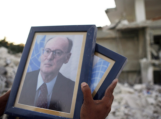 Portrait of Hedi Annabi is recovered from the rubble of UN Headquarters.  It was found still hanging.