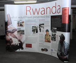 large scale poster titled: Rwanda - What would have prevented this?