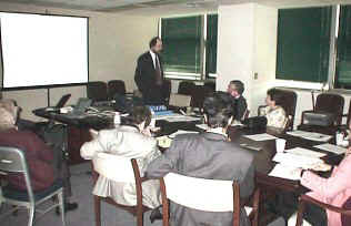 Photo of December seminar with Matt Bonham making his presentation