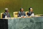 Left to right: Secretary-General Kofi Annan, Jean Ping (Gabon), President of the 59th session of the General Assembly, and Jian Chen, Under-Secretary-General for General Assembly and Conference Management. (UN Photo #NICA35512 by Ky Chung) 