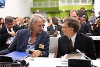 Bill Gates (right) chats with musician and activist Bob Geldof at the opening session of the MDG Advocacy Group Meeting. 