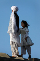 parent and girl child in Herat