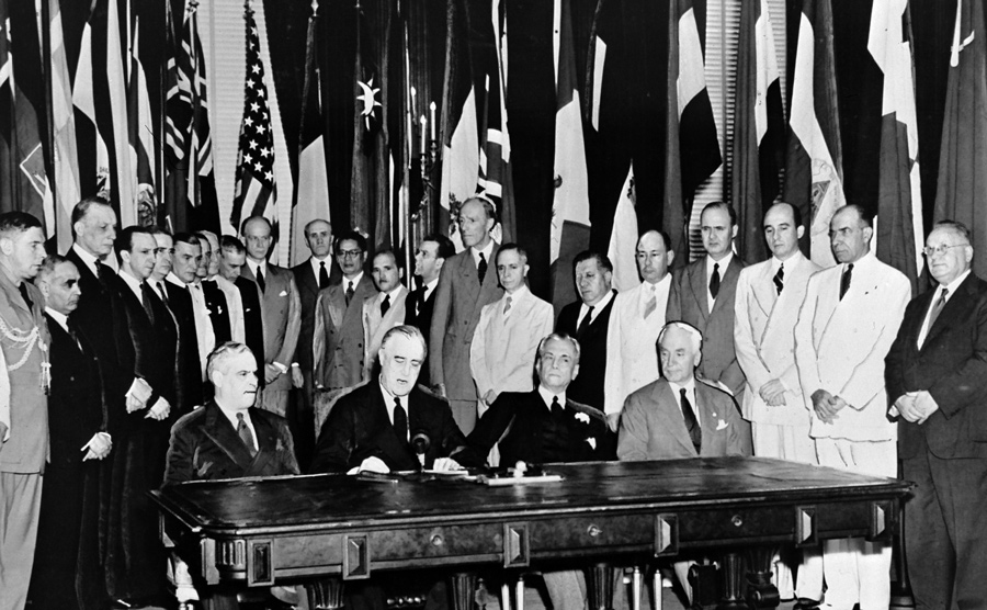 Representatives of 26 Allied nations fighting against the Axis Powers met in Washington, D.C. to pledge their support for the Atlantic Charter by signing the 'Declaration by United Nations' Representatives of 26 Allied nations pledge their support