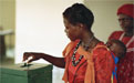 A woman casts casts her ballot at the polling station at Odangwa in Ovamboland.