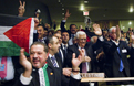 the Palestinian delegation celebrates in the General Assembly