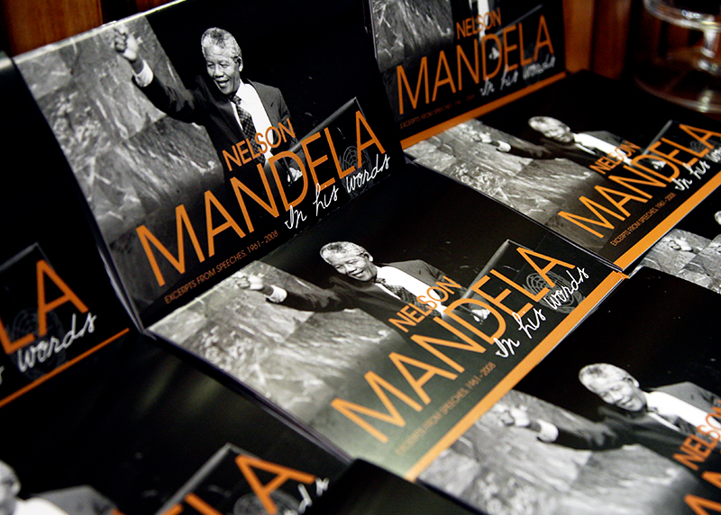 A display of the books entitled 'Nelson Mandela: In his words' on a table.