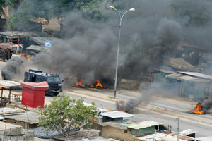 The streets of Attécoubé, in Abidjan, Côte d'Ivoire filled with smoke.