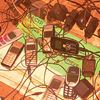 Several phones are being charged by a single generator. Many people do not have electricity in Rwanda but many people have mobile phones.