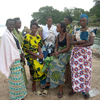 A group of women receive counseling from Sevota, a support association for genocide widows and victims of rape which is run by Godelieve.