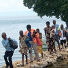 Godelieve photographs a trip that several of the women that she counsels took to Lake Kivu. These trips aim to provide a positive, supportive environment  in which the women and children that Sevota ministers to can relax and interact.