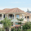 This photograph shows some of the new houses being built in Kigali. This represents a new way of life in Rwanda compared to the old one.