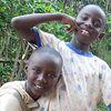 A group of children play together outside Guy Christian’s house.