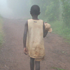 A child walks to school in the early morning.